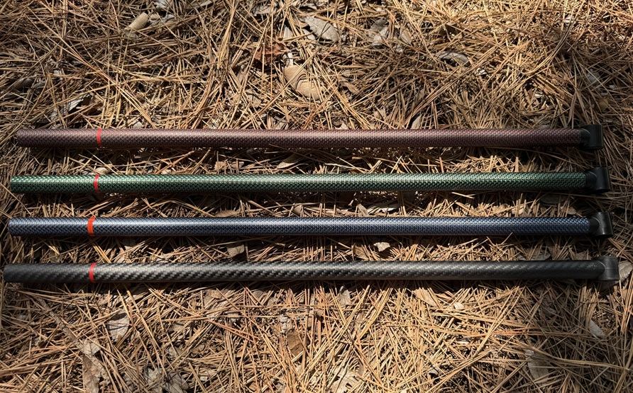 Steve's Detector Rods carbon-fiber lower rods for the Minelab Equinox 700/900, shown in red/black, green/black, blue/black, and solid black