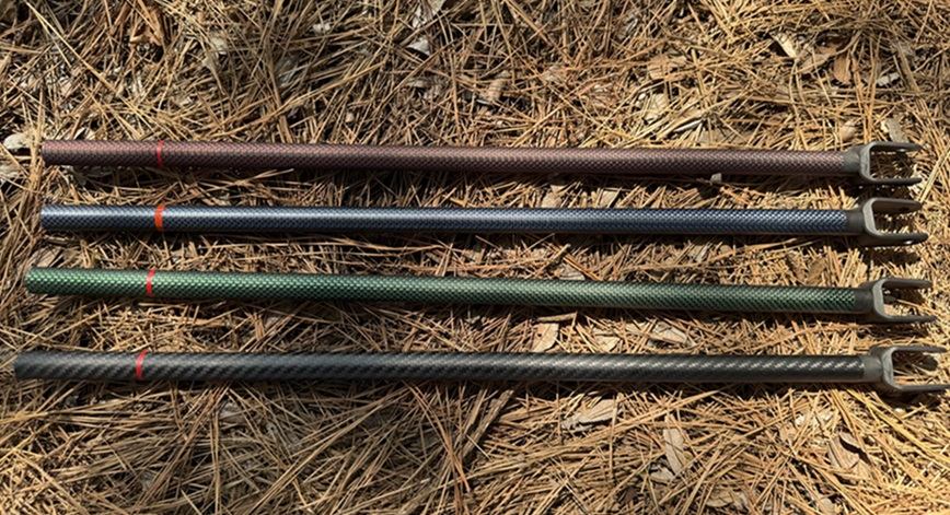 Steve's Detector Rods carbon-fiber lower rods for the Minelab Manticore, shown in red/black, blue/black, green/black, and solid black
